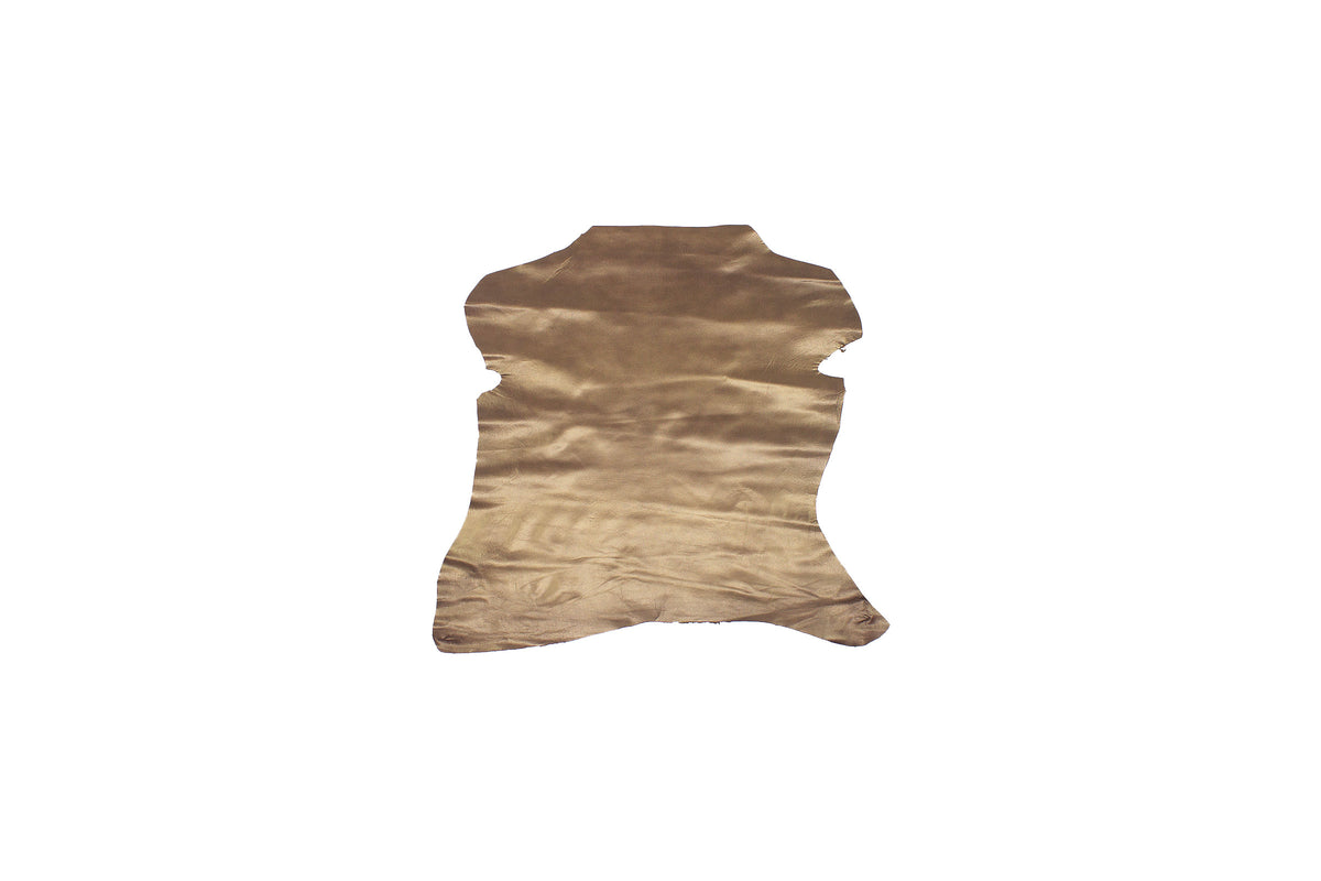 Trozo de piel forro cabra bronce