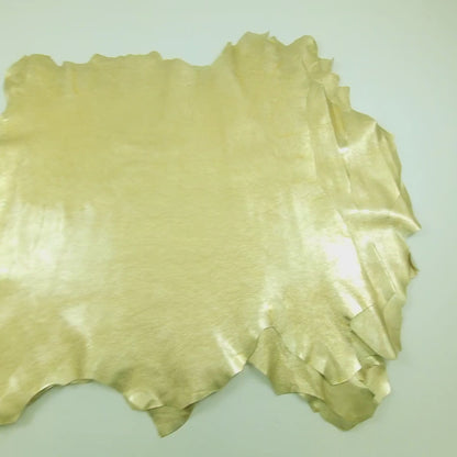Piel de fantasia charol dorado