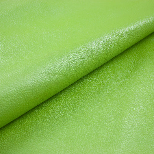 Piece of shiny pistachio green pumped bovine leather